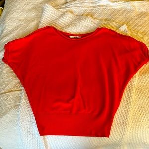 Trina Turk orange sweater , cold shoulder